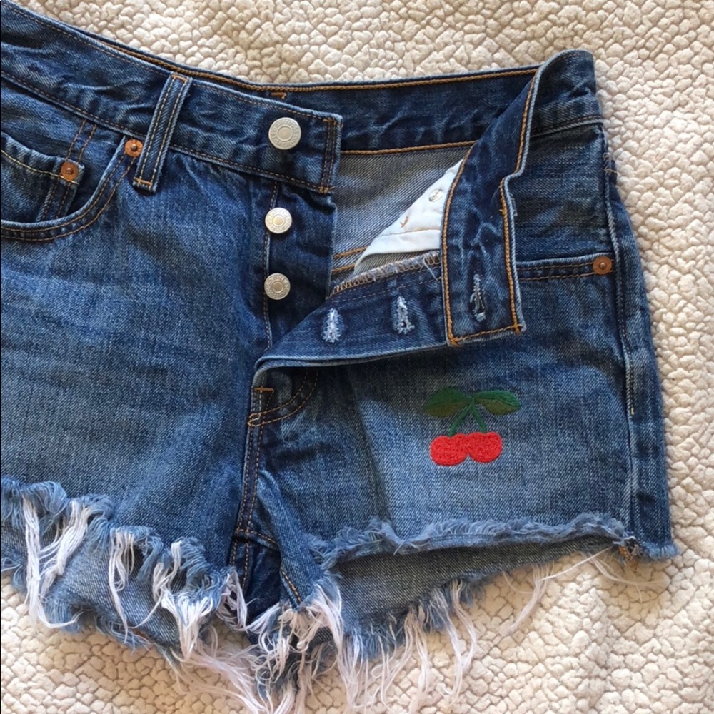 Women's 501 levi's shorts with a cherry logo